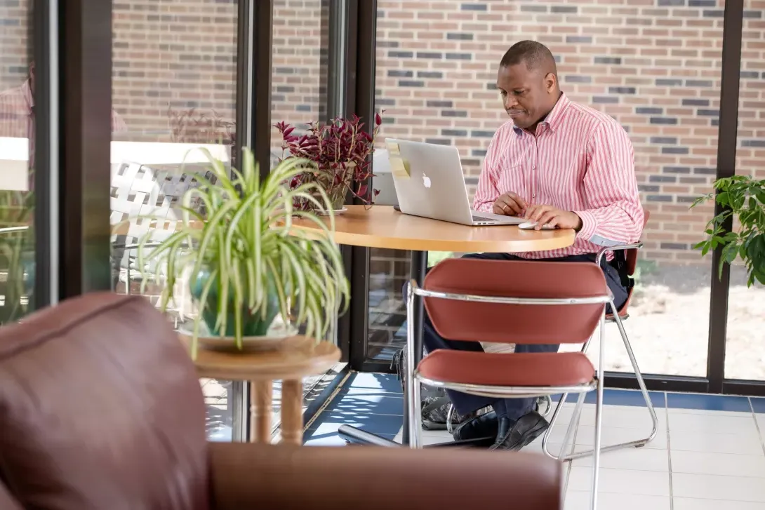 Seminary student at a computer